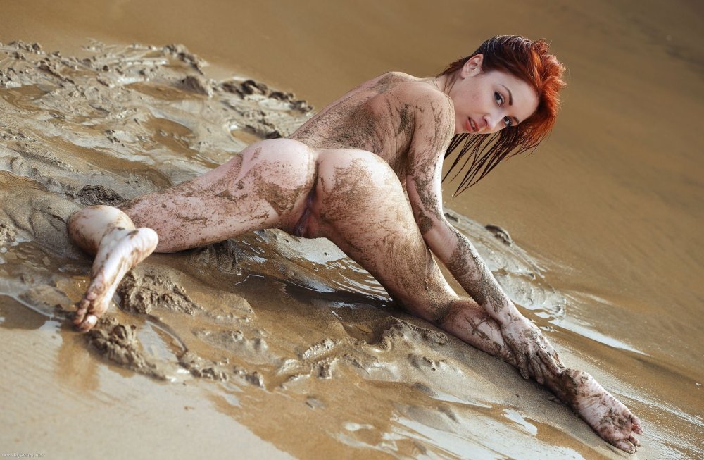 Naked women in mud baths