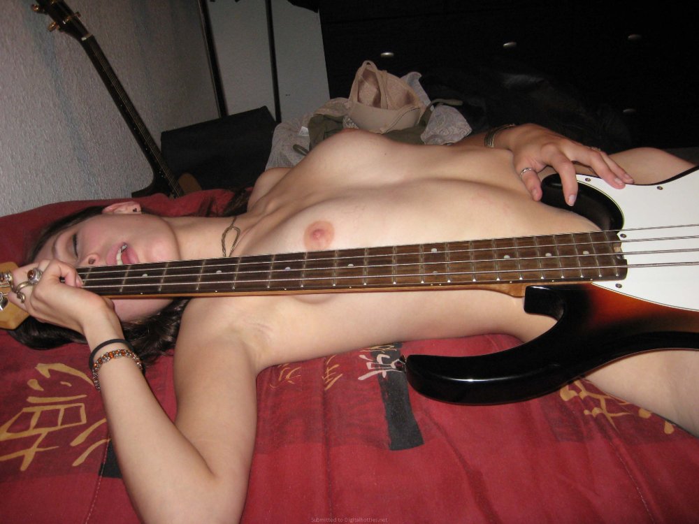 Naked women with a guitar figure