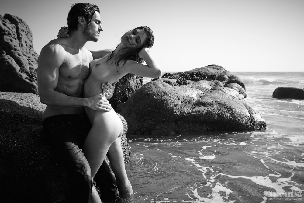 Naked girls with guys on the beach