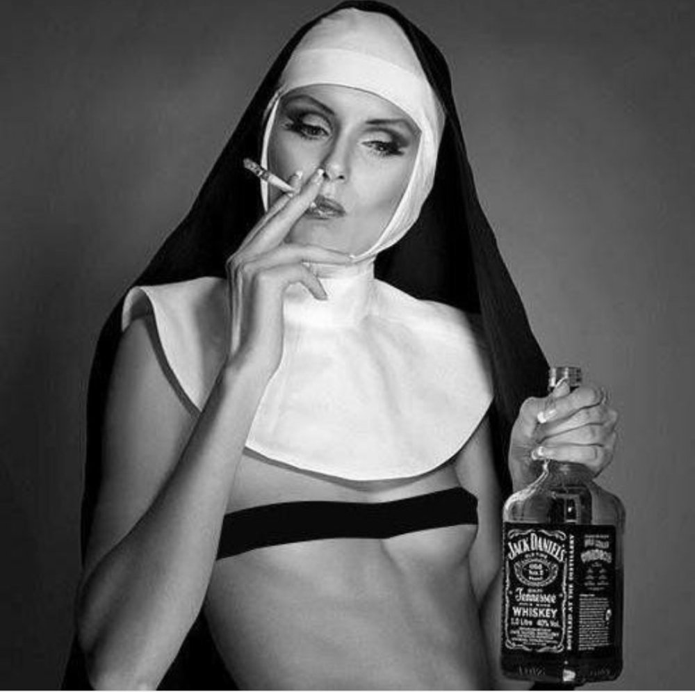 A nun with whiskey