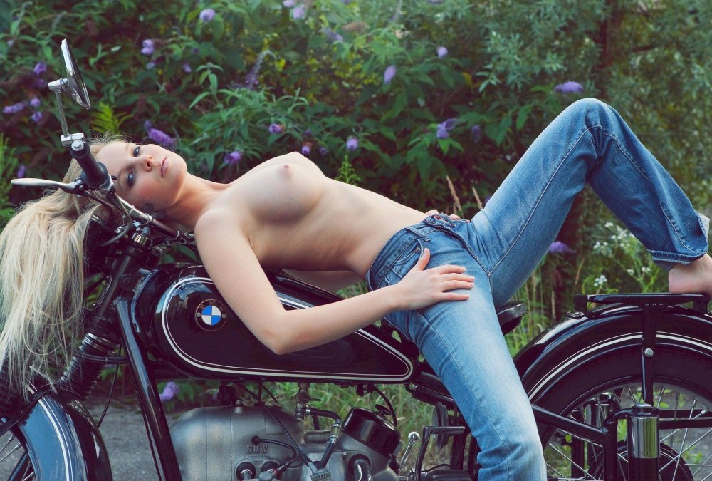 Beautiful priest Naked on a motorcycle