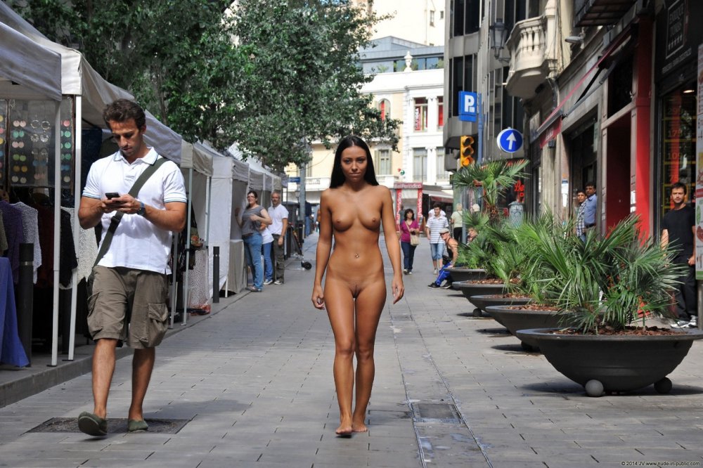 African girls walk through the streets naked