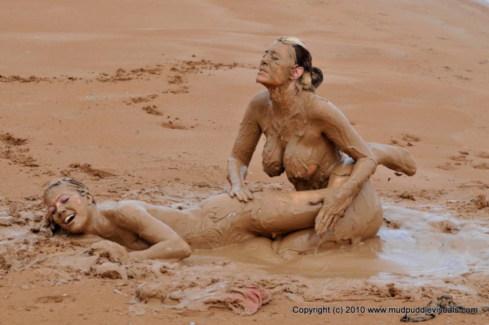 Naked mature women in mud